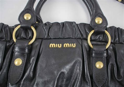 miu miu black leather handbag|miu outlet online.